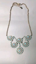 Charming Charlie faux turquoise southwestern half wheel necklace gold tone chain
