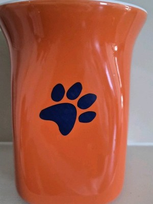 Orange Ceramic Treat Jar with Blue Silicone Lid Paw Print. 8'' Tall