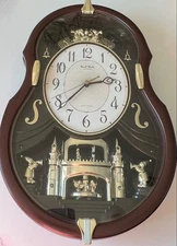 Rare Small World Rhythm Clock Violin Shaped 4MH829 Plays Melodies Lights Spins