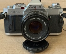 Canon AV-1 35mm Film Camera w/ 2 lenses 50mm 135mm--Film Tested and works well