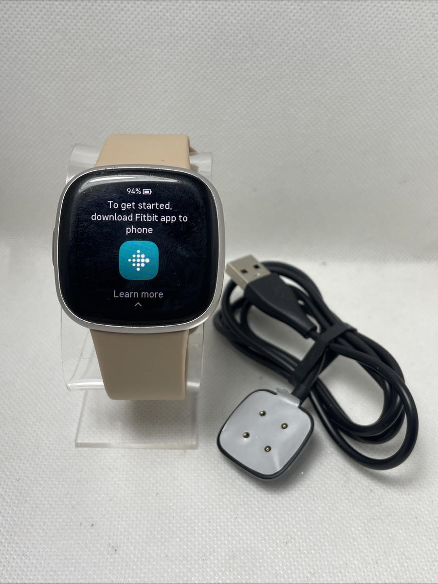 FitBit Versa 4 Fitness Smartwatch Platinum with Tan Band | eBay display picture 1