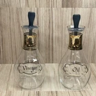 Vintage MCM Pyrex Oil And Vinegar Cruet Set w/Gold Bands and Stoppers 6.25"