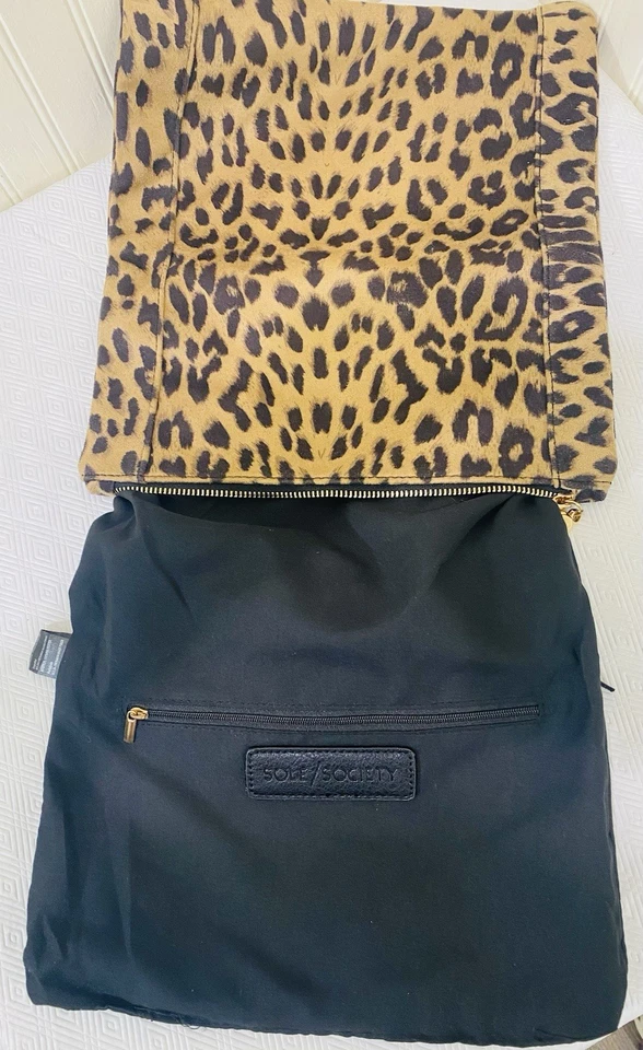 Cartera con estampado de animales Sole Society nueva sin etiquetas que vale la pena borla Foto 4 de 4