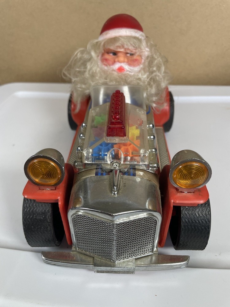 VINTAGE BATTERY OPERATED SANTA BUMP AND GO RACE CAR TIN LITHO AND PLASTIC - WORK
