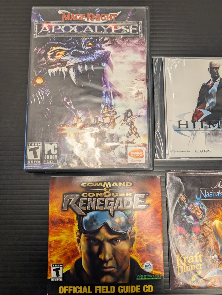 Lote de 13 juegos para PC/CD-ROM, Mage Knight Apocalypse, Fallout, Hitman, Wolfenstein Foto 2 de 4