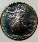 Beautifully Toned ASE - 1990 American Silver Eagle .999 Fine Silver! Rainbow!