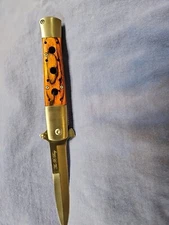 The X Bay Stiletto 9 Inches Total. 4 Inch Blade. New In Box 