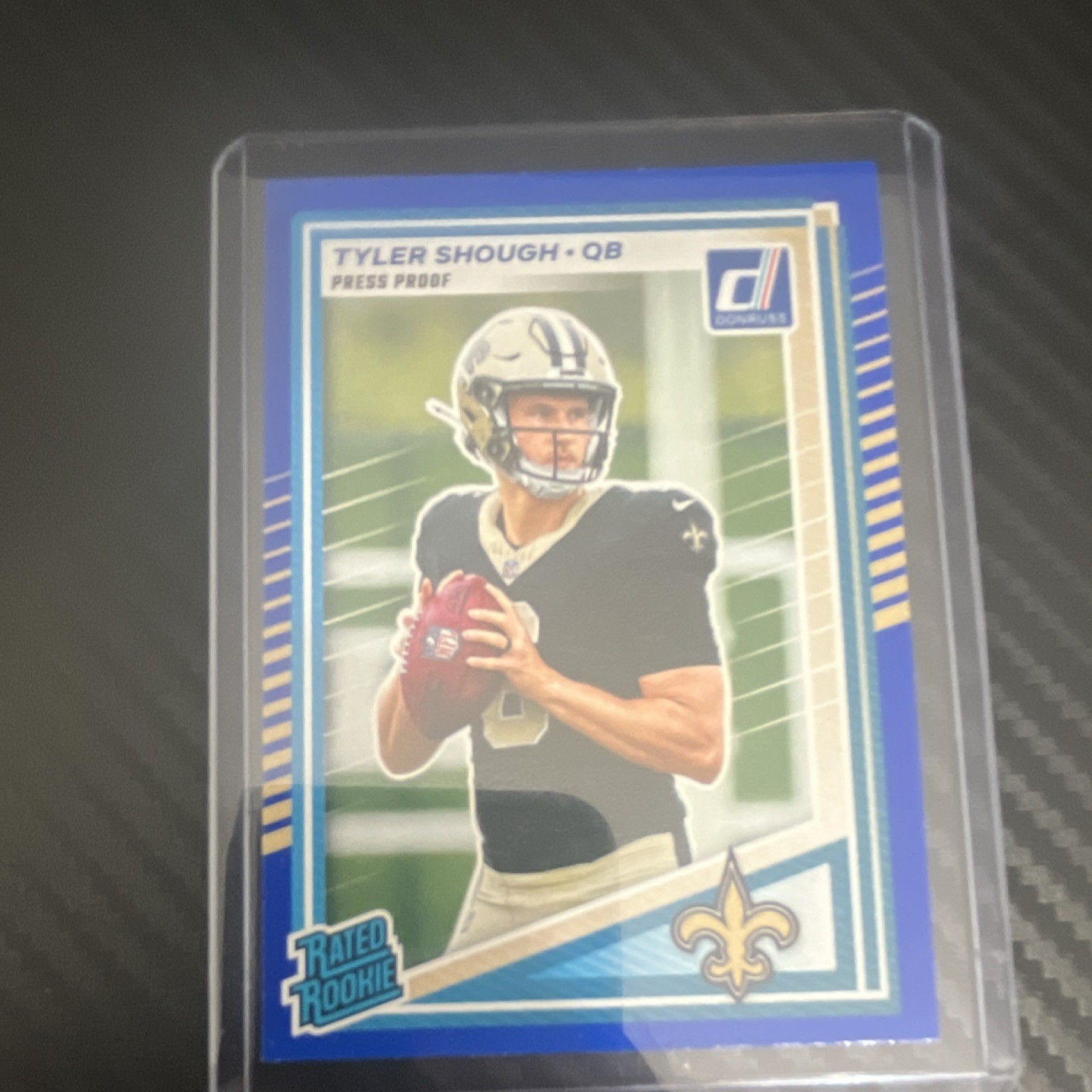 2025 Panini Donruss Rated Rookie  Blue Press Proof #304 Tyler Shough Saints