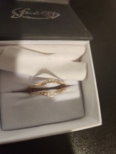 10K Rose Gold APX 1/10 CTW Round Diamond Ring...