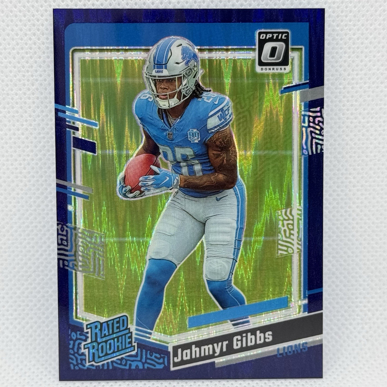 2023 Panini Donruss Optic - Rated Rookie Jahmyr Gibbs #236 Purple Shock Prizm