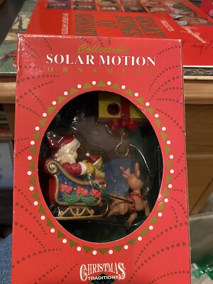 Santa Claus Sleigh Rudolph Presents Solar Motion Ornament Matrix Christmas NIB