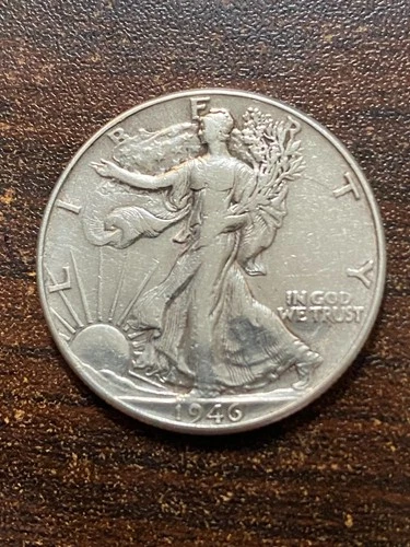 1942 p walking liberty silver coin a very fine coin .plus a surprise