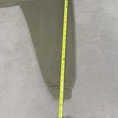 Olive green Eddie Bauer sweatshirt size L, yellow measuring tape along the side, USA made 90s.