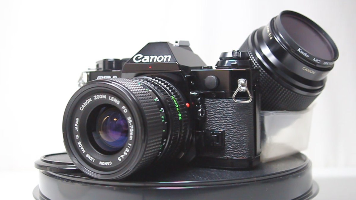Canon AE-1 Program Film Camera + NFD 35-70mm F/3.5-4.5 +