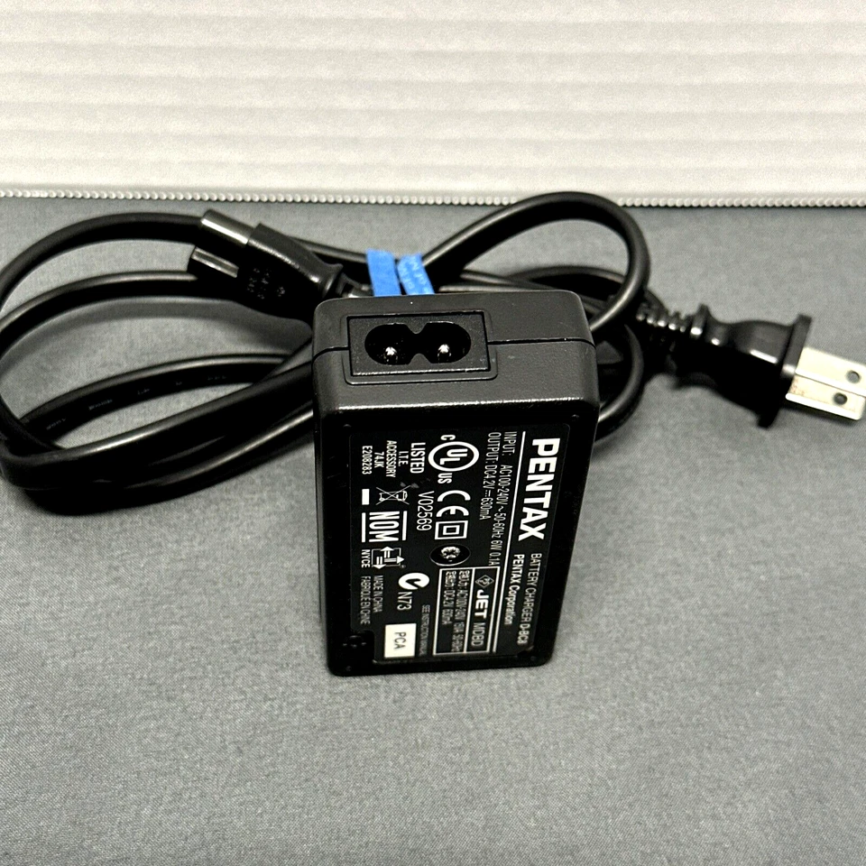 Cargador de batería Pentax D-BC8 genuino OEM para DL-18 Foto 3 de 4