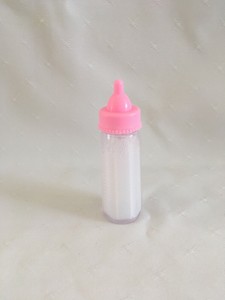 baby doll that drinks bottle