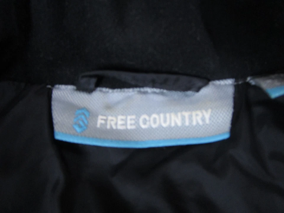 Chaleco Free Country para mujer medio acolchado negro sin mangas cremallera completa senderismo Foto 4 de 4