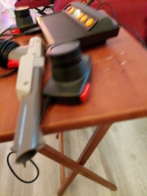 Atari flashback 7 classic game console Tested/ With Nes light Gun as-is Overall 