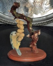 Naturalistic Sharratt and Simpson Blue Tit Eating Peanuts on Branch on Wood Base