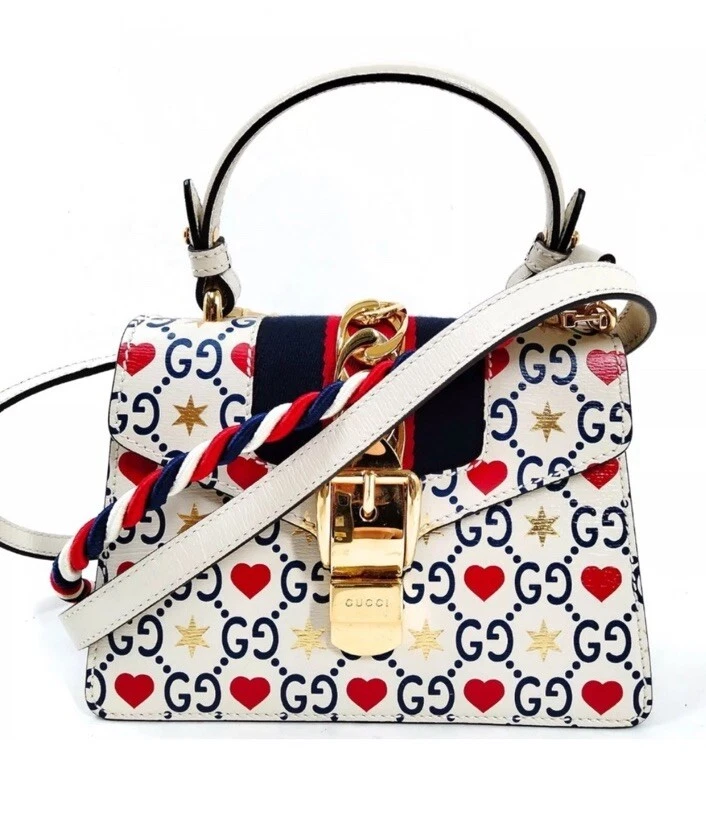 Borsa a mano Gucci edizione limitata in pelle bianca Sylvie Mini cuore GG stampa monogramma
