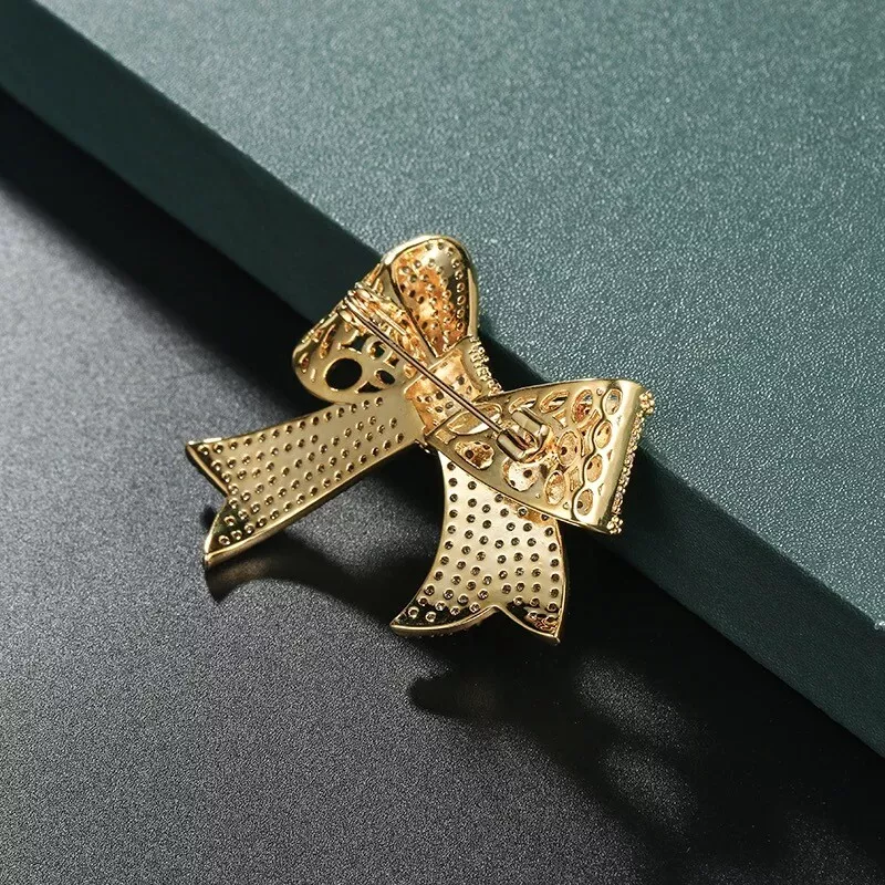 Gold on sale bow brooch