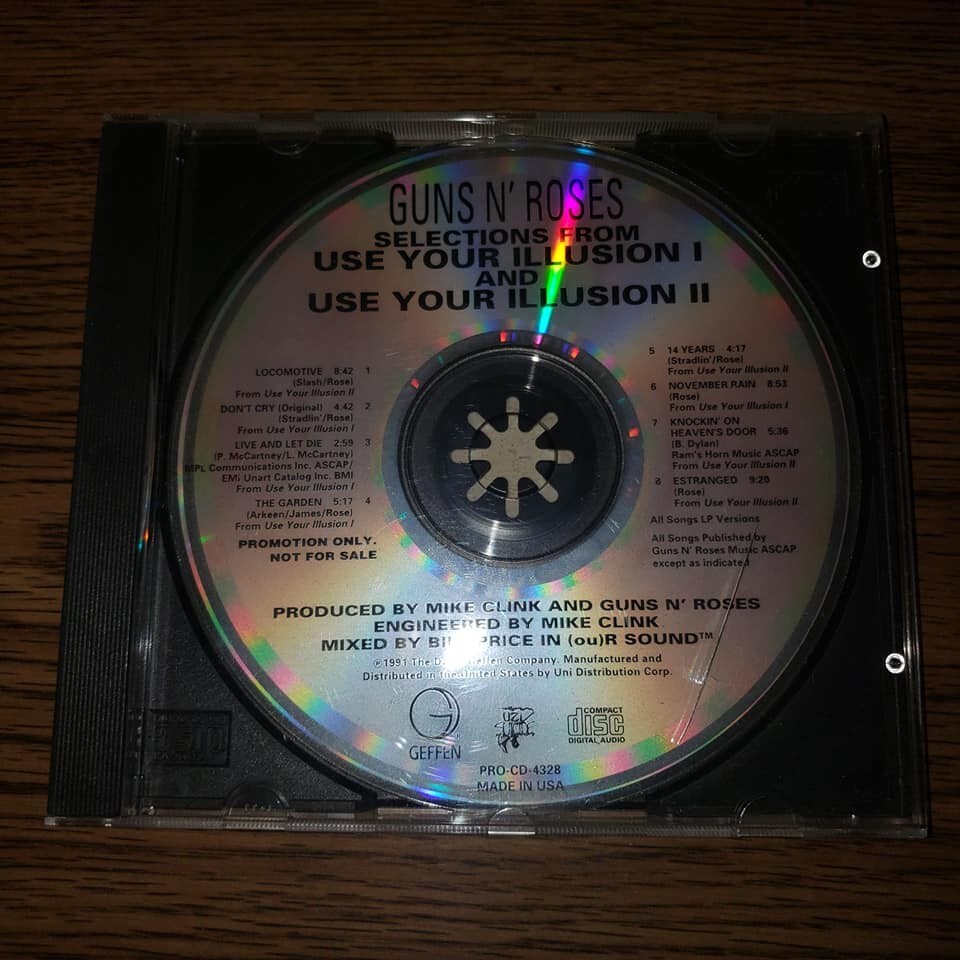 GUNS N’ ROSES USE YOUR ILLUSION Promo CD s-l400.jpg