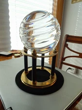 DECORATIVE GLASS BALL SPHERE ORB ON ORNATE ACORN-TIPPED BRASS/BLACK METAL STAND