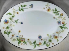 Noritake Nouveau pattern 2402 Platter with silver edge, pristine. 14” X 10”