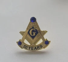 Masonic 50 year service lapel pin Gold blue stones 