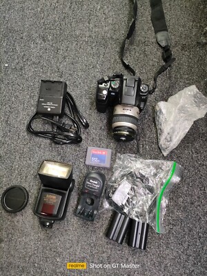 Konica Minolta Maxxum 5D with bag filled with equipment and accessories!