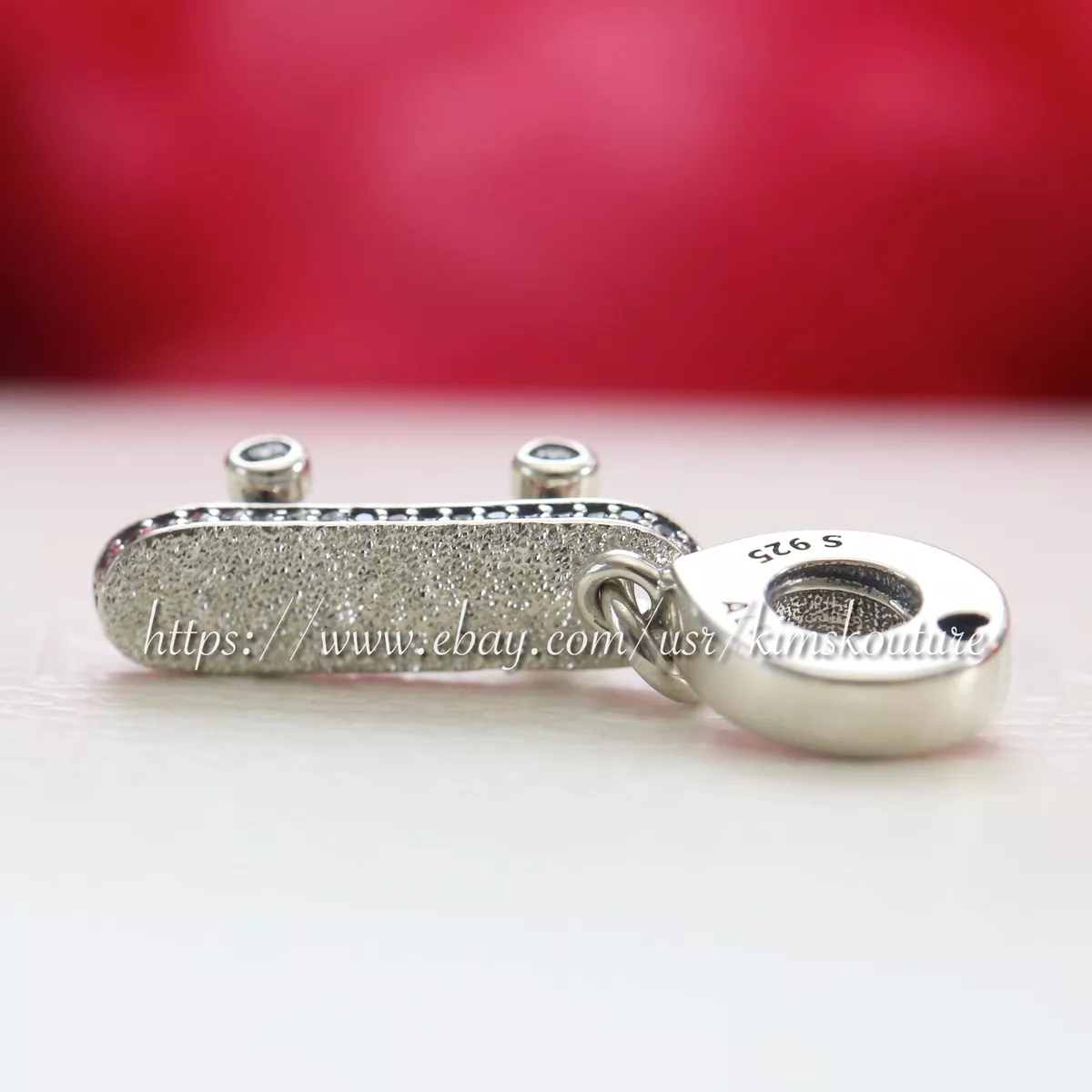 Pandora skateboard deals charm