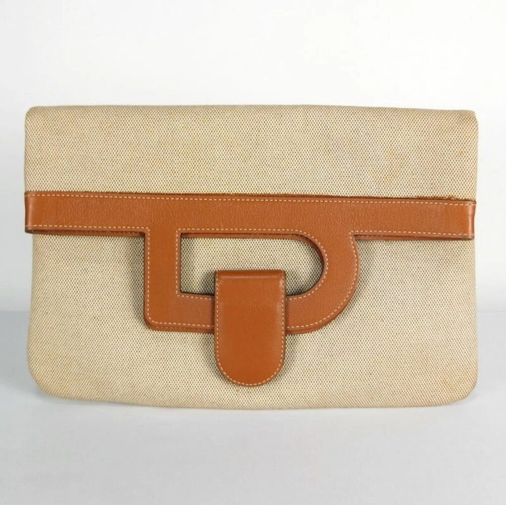 Delvaux clutch best sale bag