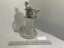Silver plate and cut glass water pitcher