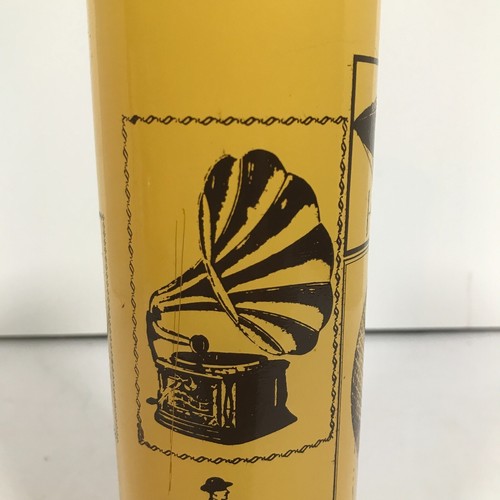 9 Inch Yellow Glass Unscented Candle With Black Antique Artifacts Images - Picture 5 of 19