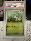 Bulbasaur - 046 (Cosmos Holo) 046 Sv: Scarlet & Violet Promo Cards Holo - PSA 9
