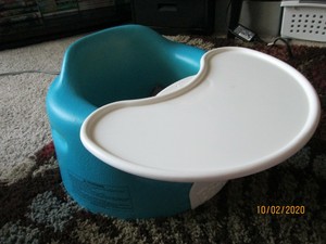 blue bumbo seat with tray