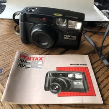 Pentax IQZoom 900 35mm Film Camera w/ Manual Great Condition Untested.
