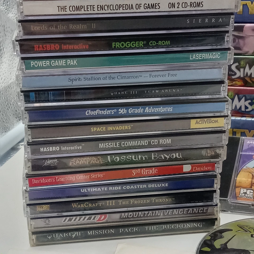 HUGE PC Video Game Lot COD WOW Sims StarCraft Quake 180 Games Untested - Image 3 of 4