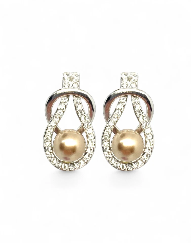 Deslumbrantes brincos de bronze com nó de recife Swarovski Elements folheados a ouro 18K - Imagem 2 de 4