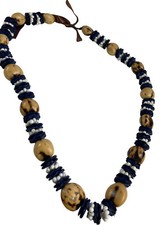 Brown Tagua Nut Seed Pod and Shell Necklace Brown Ribbon Tie Approximately 15  