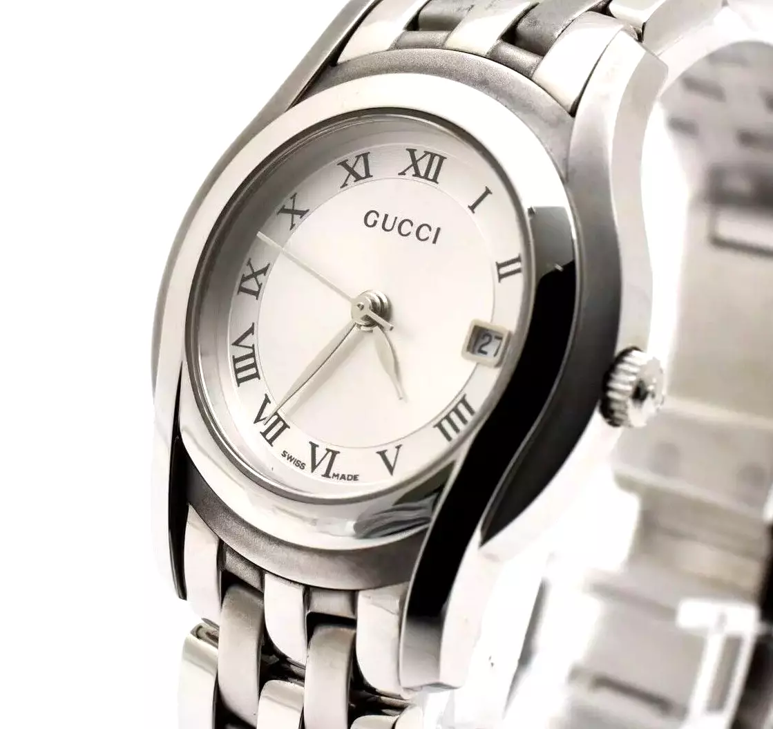 Montre à quartz femme vintage [N COMME NEUVE] Gucci 5500L argent date du Japon