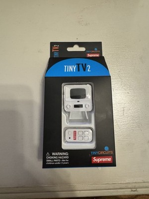 Supreme Tiny TV 2 Mini Television With Remote In Hand Ready To