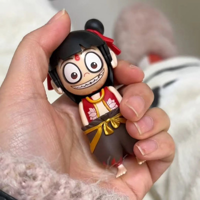 Magic Boy Sea of Troubles Toy Press Face Changing Pendant