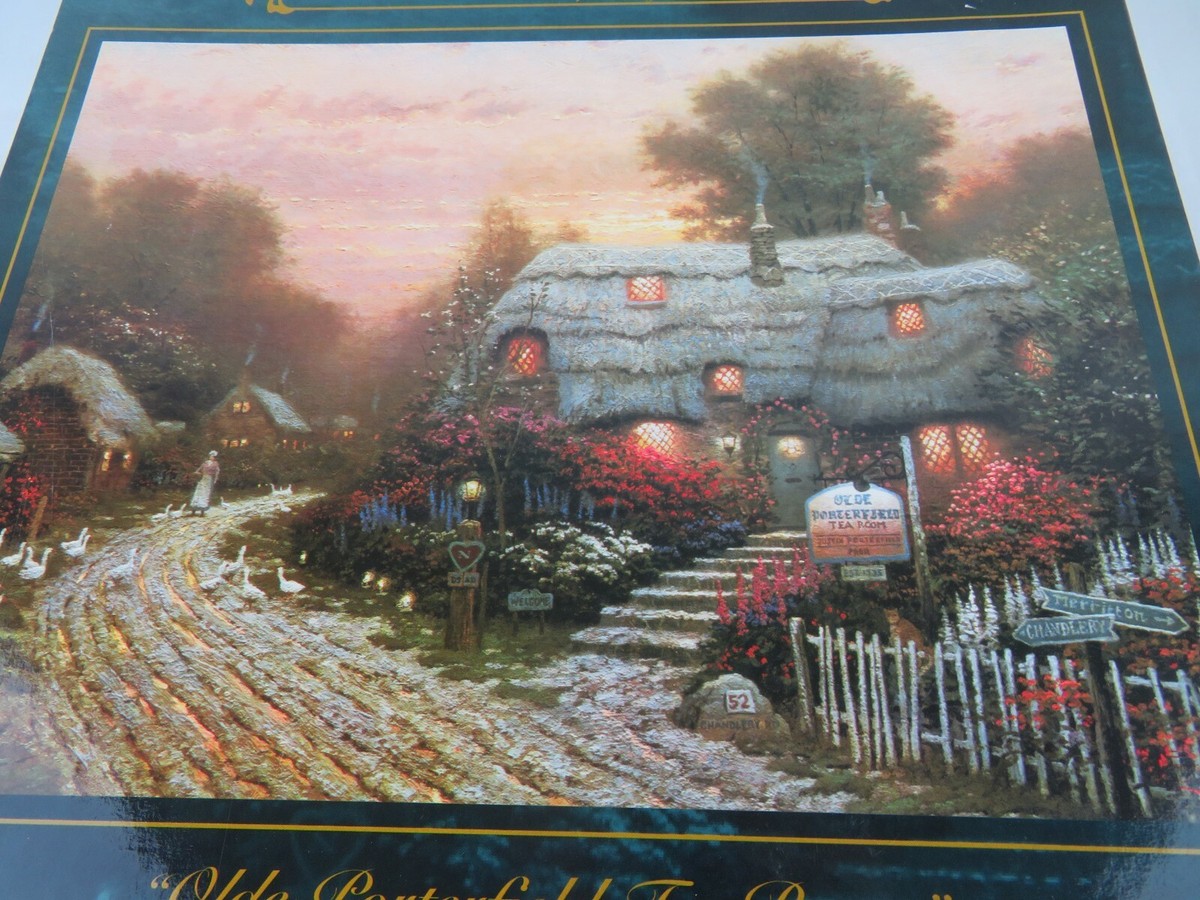 A 1000 PIECE JIGSAW PUZZLE BY THOMAS KINKADE OLDE PORTERFIELD TEA