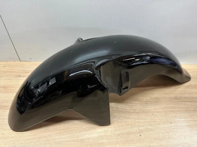 UN GARDE BOUE AVANT NOIR ORIGINE 61100-KON-D100 HONDA CB125FJC84 2021 2022 - Photo 1/4