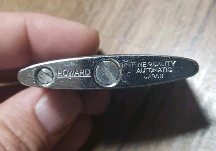 Encendedor de cigarrillos publicitario plano de cerveza GUINNESS "Brew de cuerpo completo" de colección Foto 3 de 4