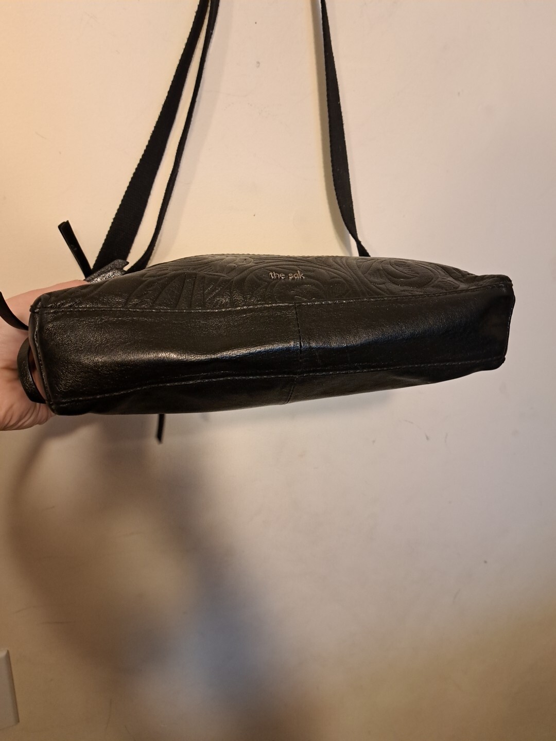 The Sak Reseda Floral Leaf Embossed Black Leather Shoulder Crossbody