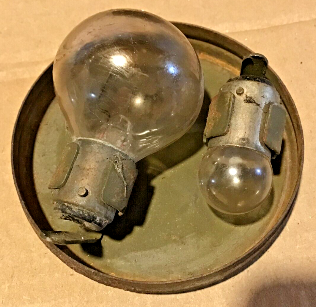 TWO AUTOMOBILE GAUGES & ORIGINAL HEADLIGHT & SIDELIGHT BULB HOLDER