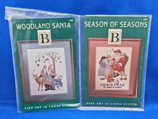 Vtg Lot 2 Studio B Christmas X Stitch Charts Season of Seasons & Woodland Santa