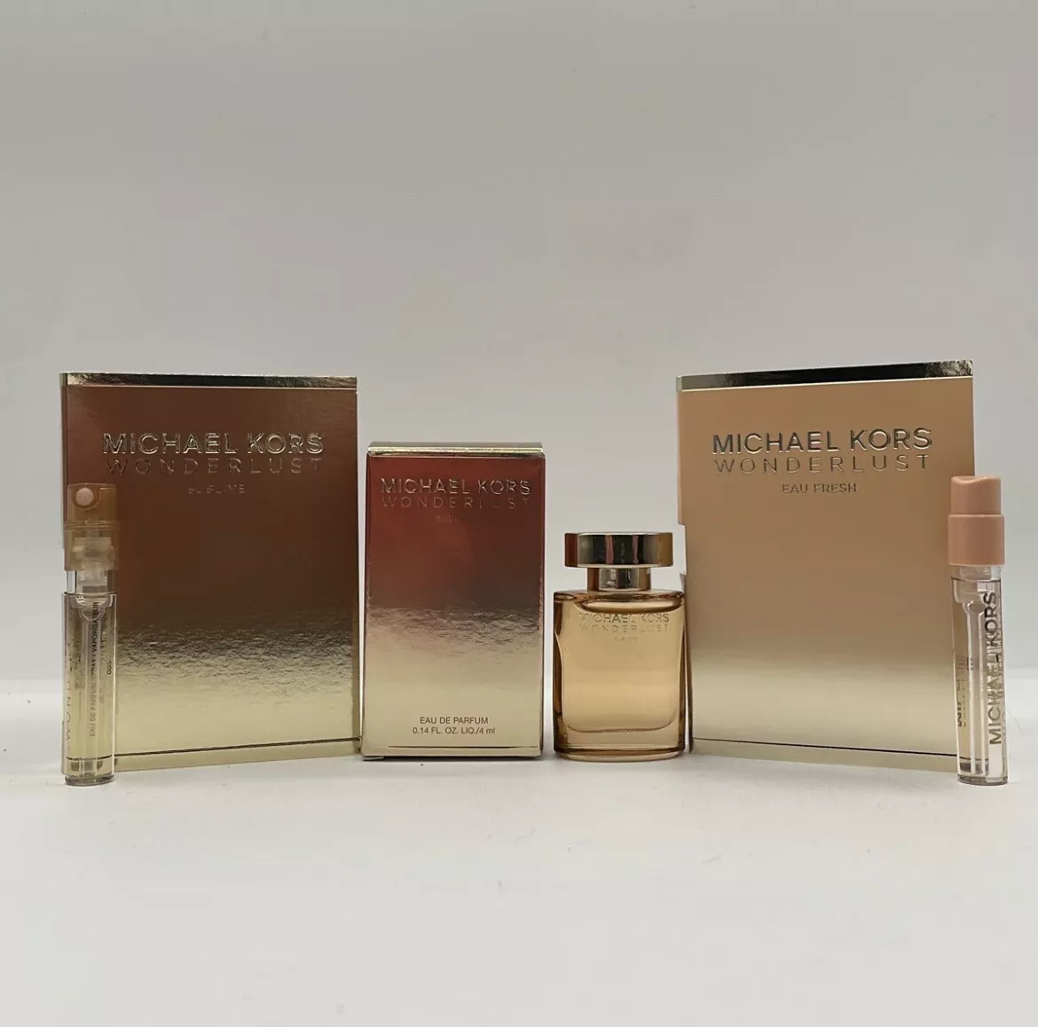 Michael Kors Receive a Complimentary a Wonderlust Deluxe Mini with any 100 purchase from the Michael Kors fragrance collection Macys #46 Michael Kors Receive a Complimentary a Wonderlust Deluxe Mini with any 100 purchase from the Michael Kors fragrance collection Macys